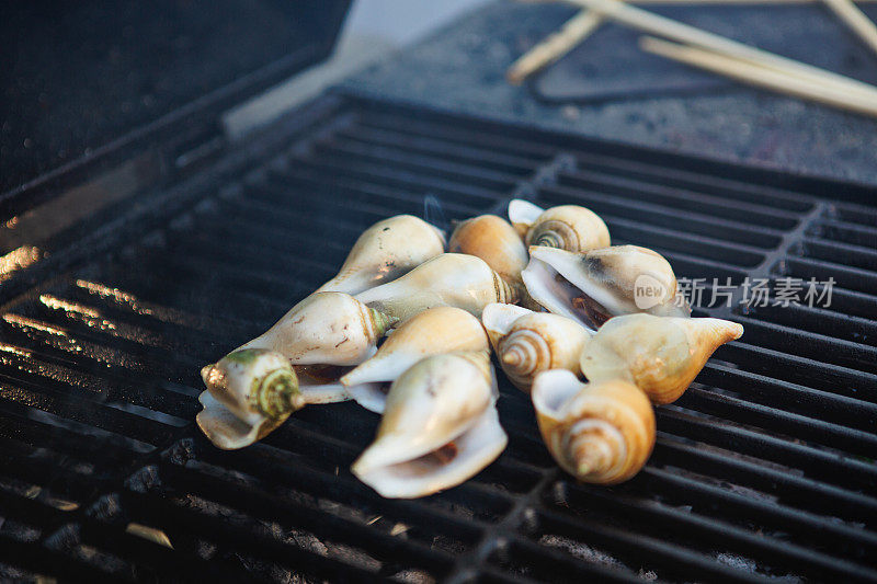 Seafood snails on grill